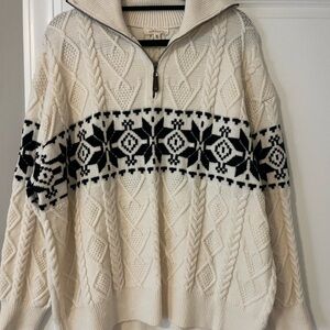 Cozy Cream and Black Turtleneck Sweater